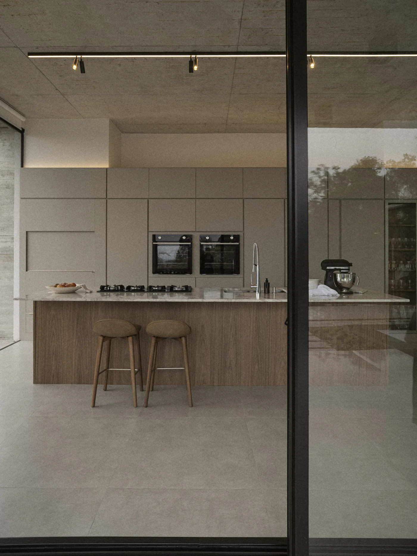 The kitchen seen through the glass